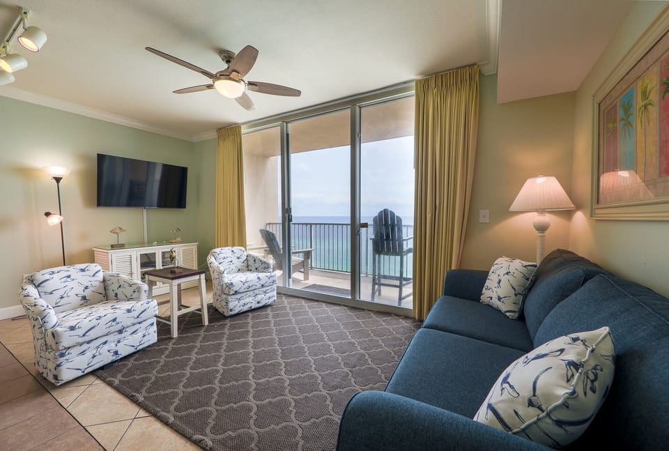 Large flatscreen TV in the living room with New Swivel Chairs