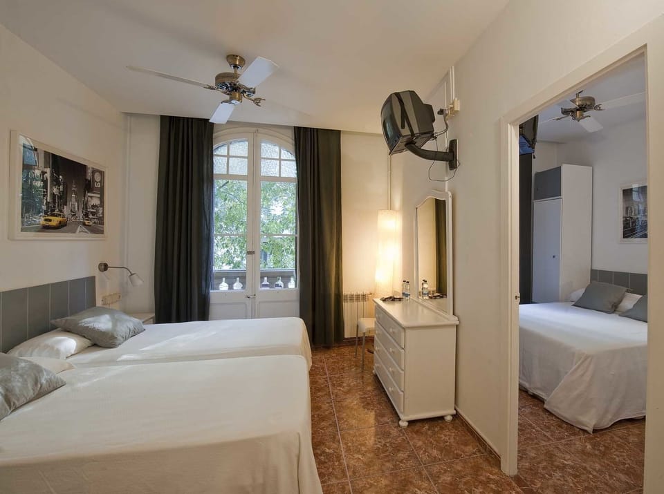 Standard Quadruple Room | Bathroom | Hair dryer, towels