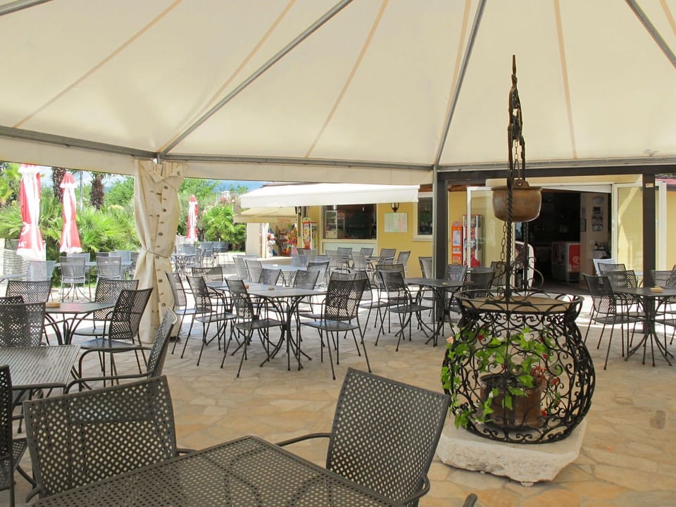 Table, Furniture, Plant, Chair, Shade, Building, Outdoor Furniture, Outdoor Table, Leisure, Real Estate