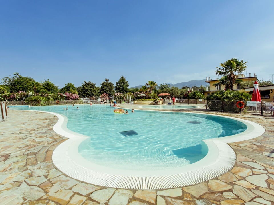 Swimming Pool, Resort, Vacation, Property, Sky, Resort Town, Azure, Leisure, Water, Summer