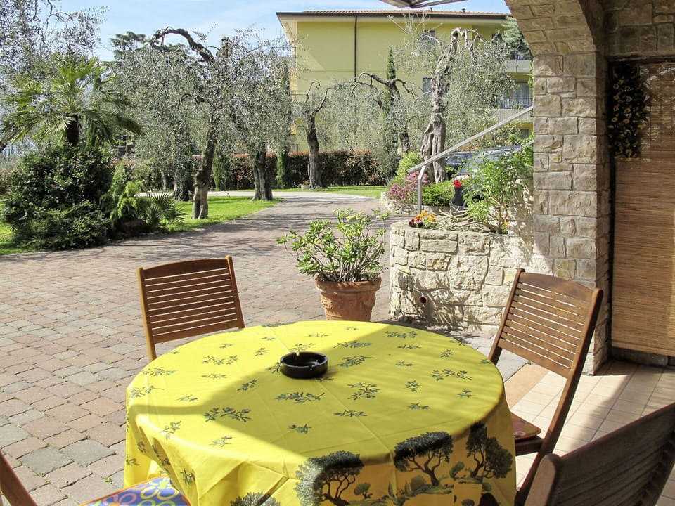 Plant, Table, Furniture, Property, Chair, Building, Flowerpot, Botany, Outdoor Table, Outdoor Furniture