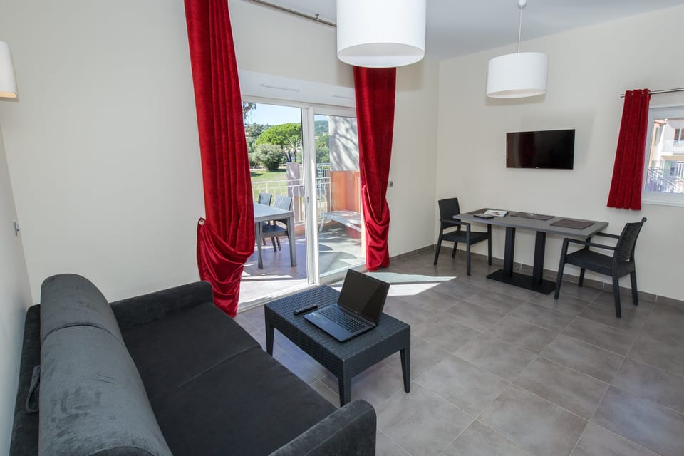 Sink into the cozy sofa after a day exploring the area.