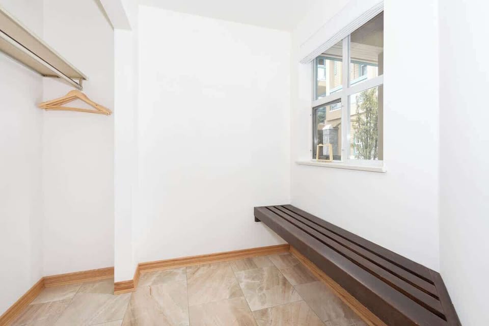 - Bright entry area with wooden bench and window views  
- Simple clean Whistler design blending style and function  
- Perfect place to prep for outdoor adventures year-round  
