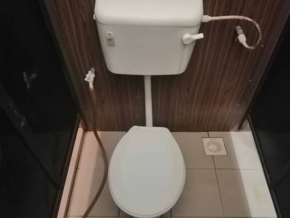 Standard Shared Dormitory, Women only | Bathroom | Shower, rainfall showerhead, free toiletries, bidet