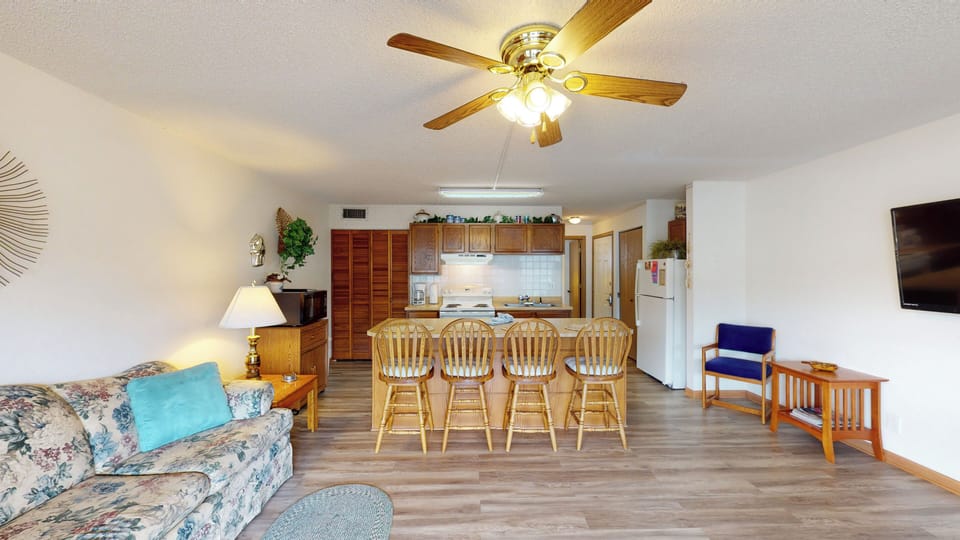 LIVING AREA AND BREAKFAST BAR