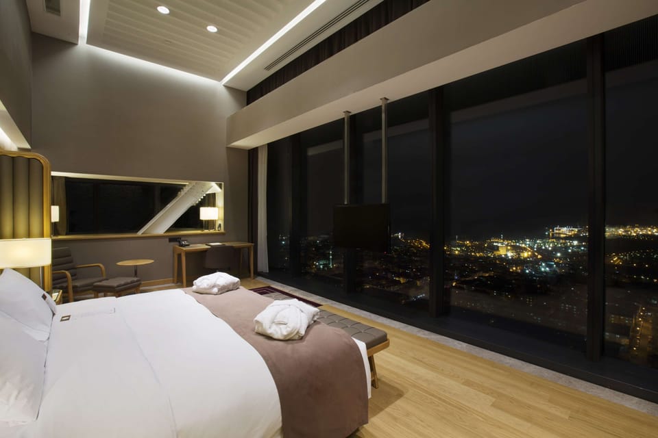 Suite, 1 King Bed (Duplex with Loft) | Premium bedding, down comforters, minibar, in-room safe