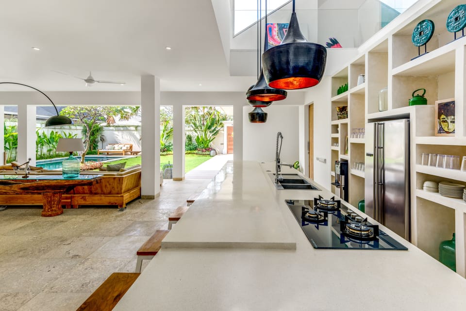 Villa Momentai | Private kitchen | Fridge, highchair