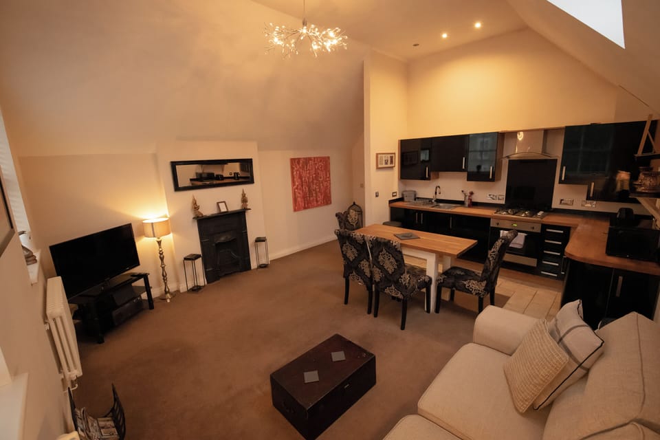 Apartment | Living area | 30-inch TV with digital channels