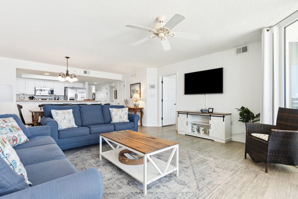 Open concept living, dining and kitchen area.