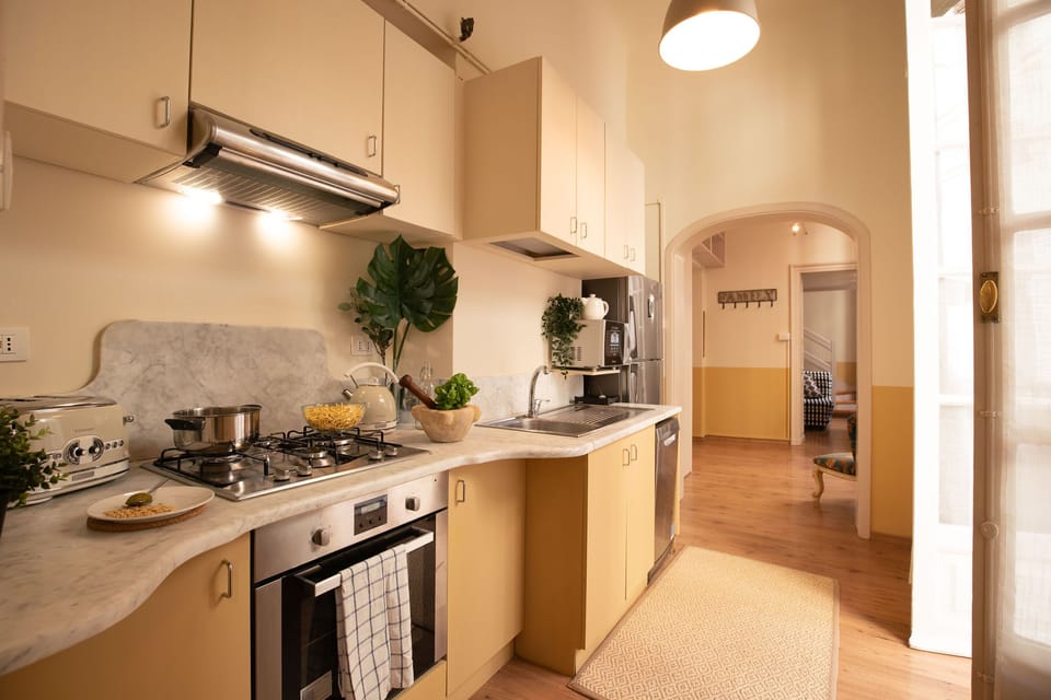 Apartment, 2 Bedrooms | Private kitchen | Full-size fridge, stovetop, highchair, cookware/dishes/utensils