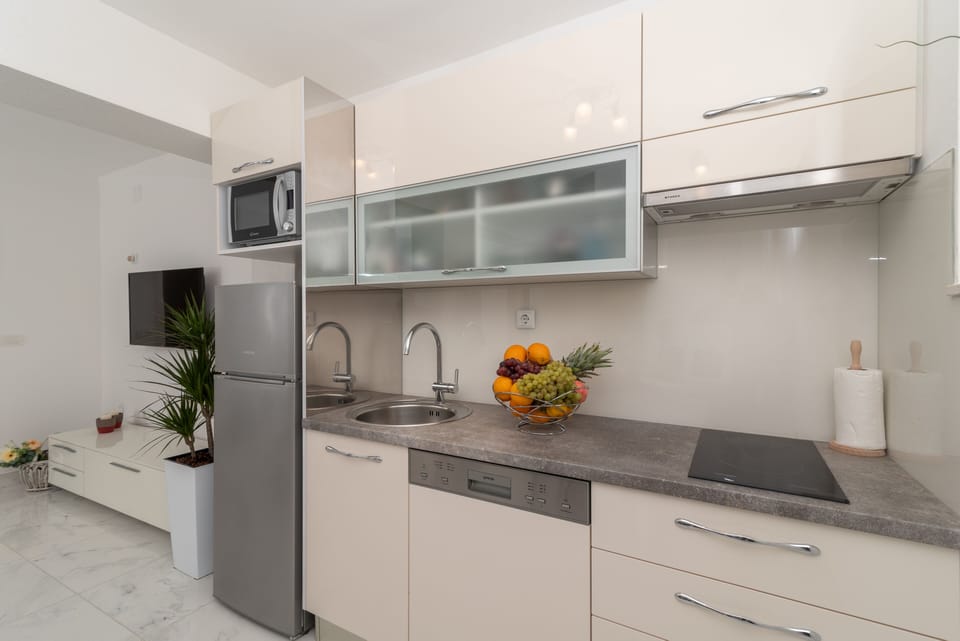 Apartment, 2 Bedrooms, Private Pool | Private kitchen | Full-size fridge, microwave, stovetop, dishwasher