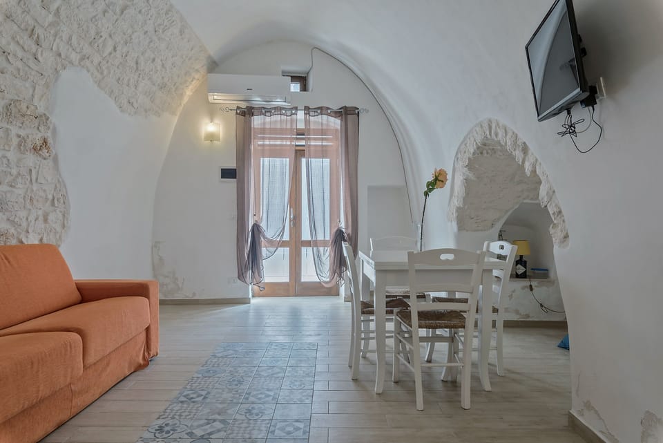 Apartment, 1 Bedroom | Living area | Flat-screen TV