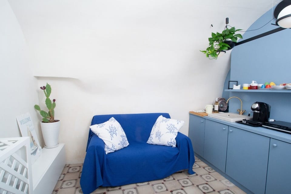 Apartment, 1 Bedroom | Living area | Flat-screen TV