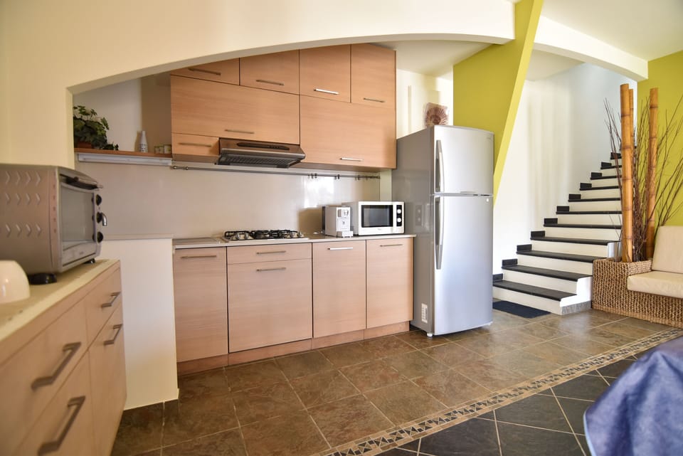 Villa, 2 Bedrooms | Private kitchen | Full-size fridge, microwave, oven, stovetop