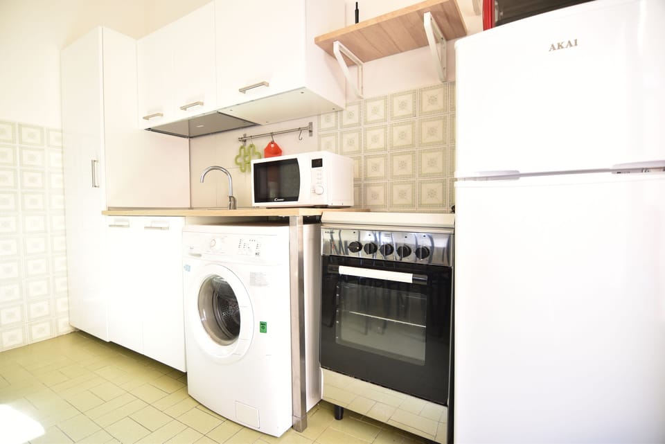 Apartment, 2 Bedrooms | Private kitchen | Full-size fridge, microwave, oven, stovetop