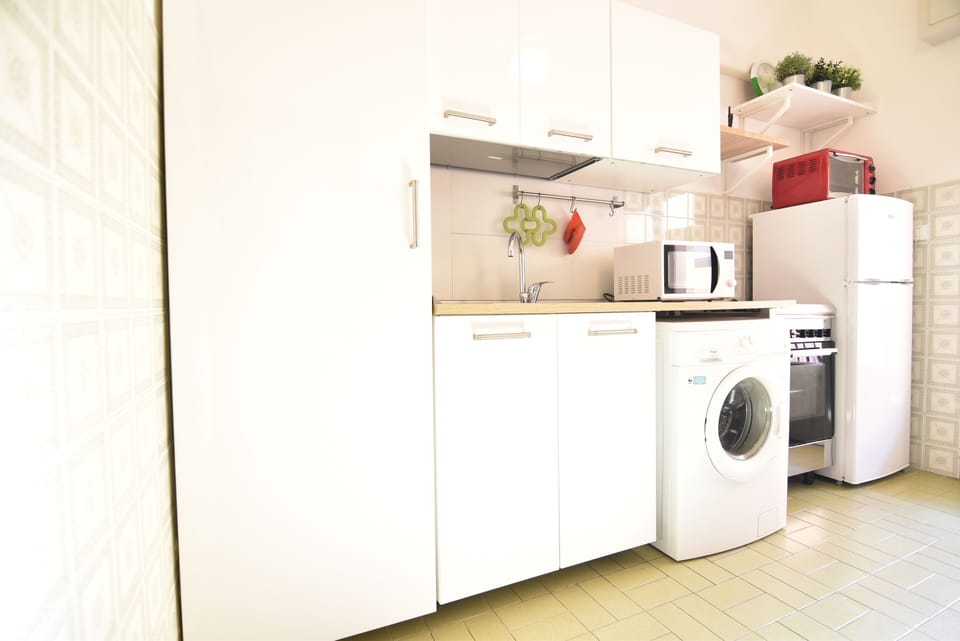Apartment, 2 Bedrooms | Private kitchen | Full-size fridge, microwave, oven, stovetop