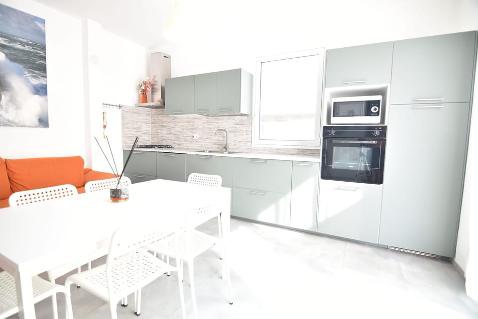 Apartment, 3 Bedrooms | Living room | Flat-screen TV