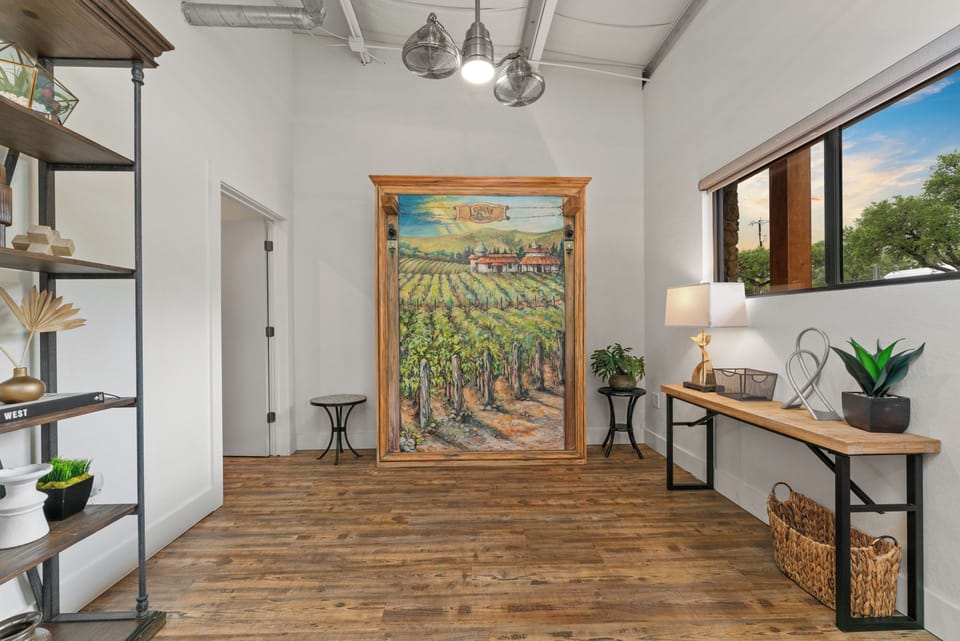 Murphy Bed in upright position. Has dedicated bathroom & privacy curtain.