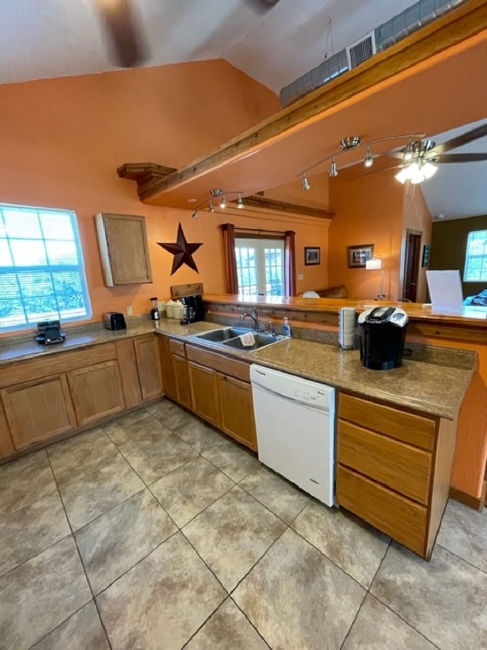 Kitchen has all needed essentials, pots, pans, dishes, flatware. 