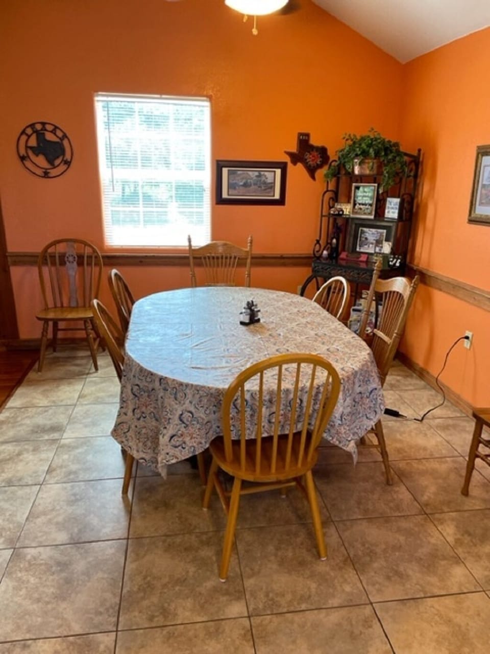 Dining seating for eight; the bar in the kitchen seats three. 