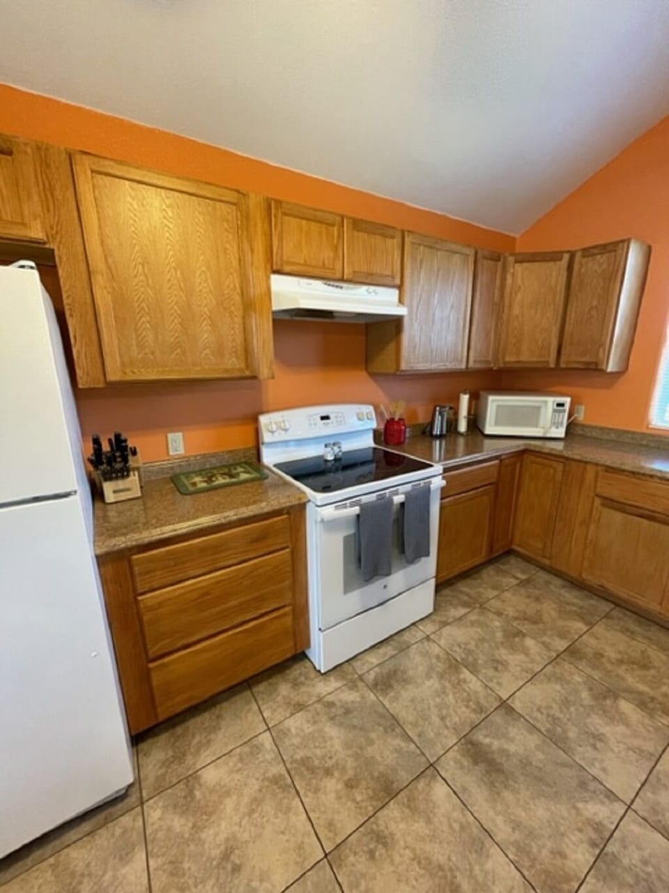 Microwave oven, waffle maker, toaster. 