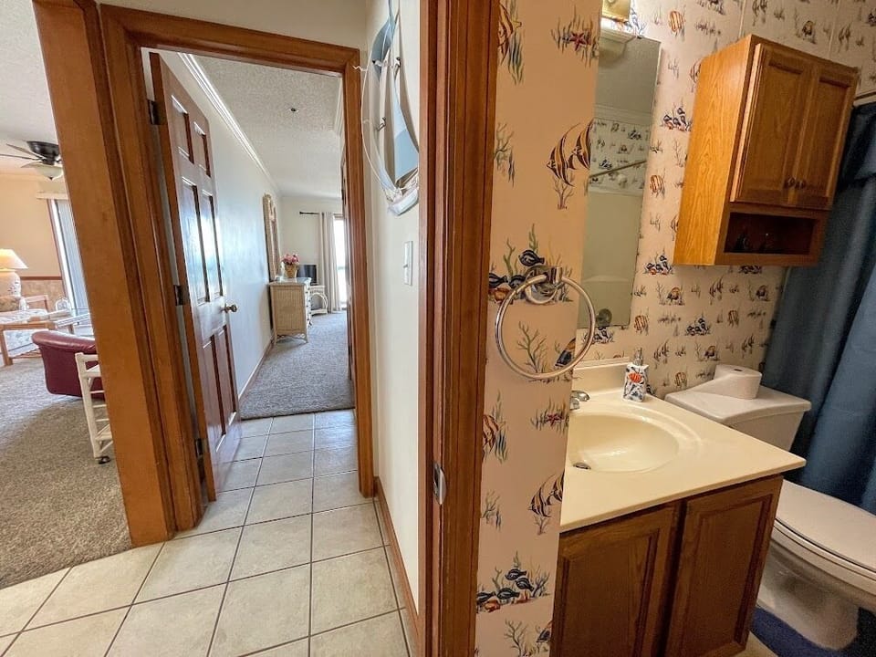Hall bath and entry to bedroom 3