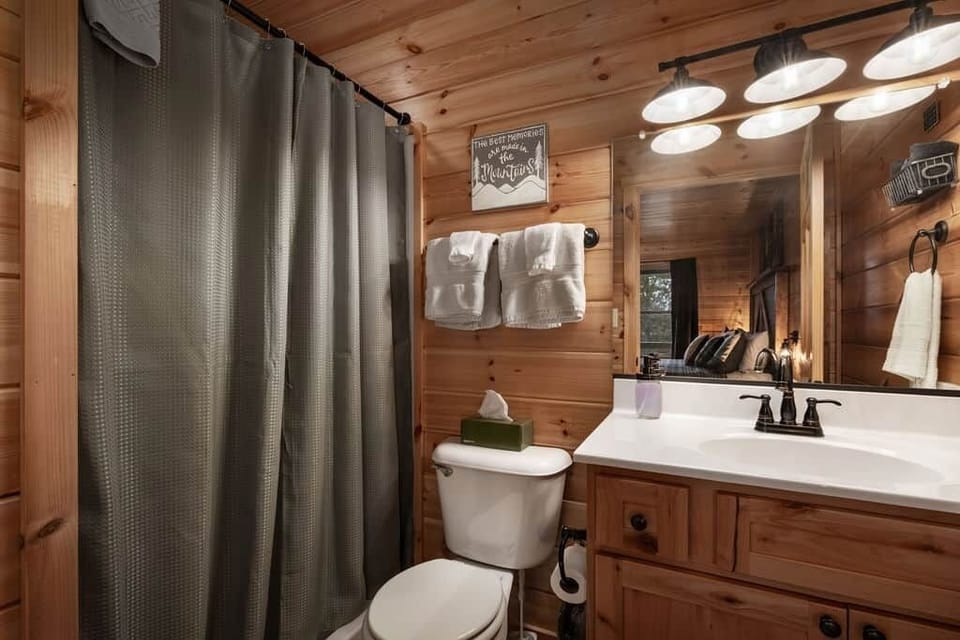 The en suite master bathroom offers a shower and low-curb shower.