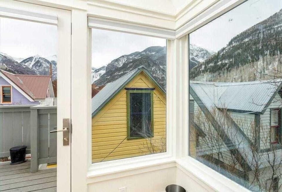 Ample windows provide lots of light to bedroom. Enjoy deck access from the bedroom level.