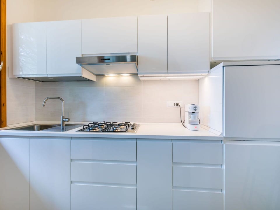 Kitchen Sink, Cabinetry, Tap, Sink, Kitchen Appliance, Countertop, Kitchen Stove, Kitchen, Interior Design, Flooring