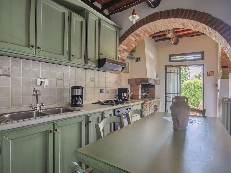 Property, Kitchen Sink, Furniture, Cabinetry, Countertop, Sink, Table, Kitchen Stove, Interior Design, Wood