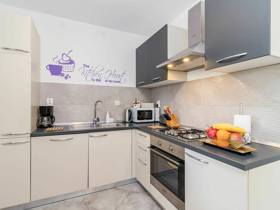 Cabinetry, Countertop, Property, Sink, Kitchen Sink, Tap, Kitchen Stove, Kitchen, Kitchen Appliance, Interior Design