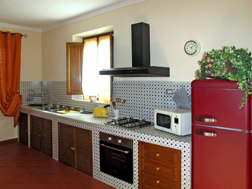 Countertop, Room, Furniture, Kitchen Stove, Cabinetry, Kitchen, Property, Major Appliance, Stove, Kitchen Appliance