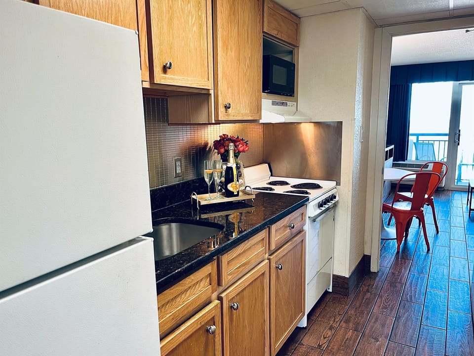 Cook up in our kitchen equipped with necessary appliances!