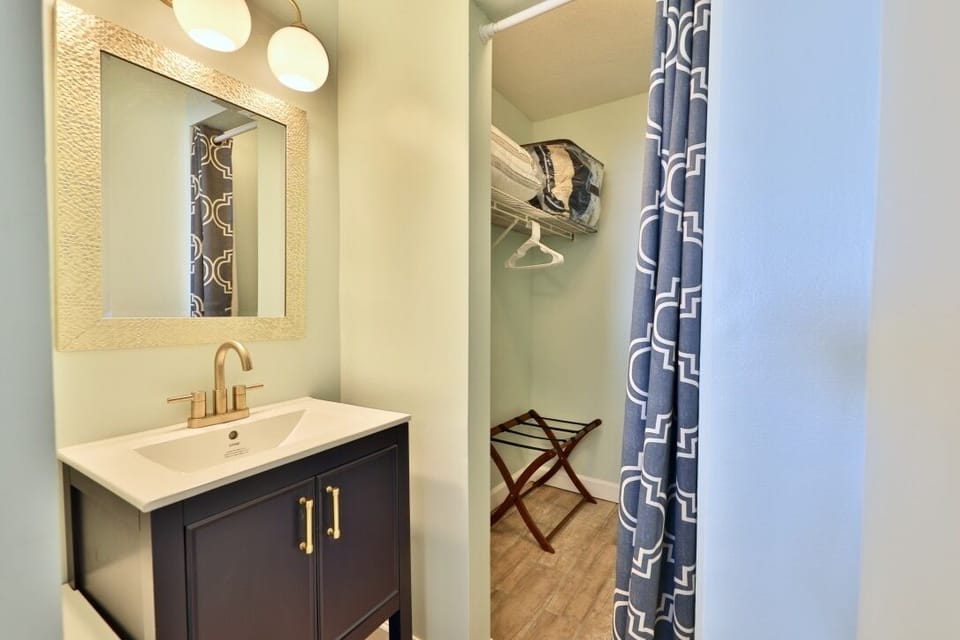 Additional vanity and walk in closet in the master suite.