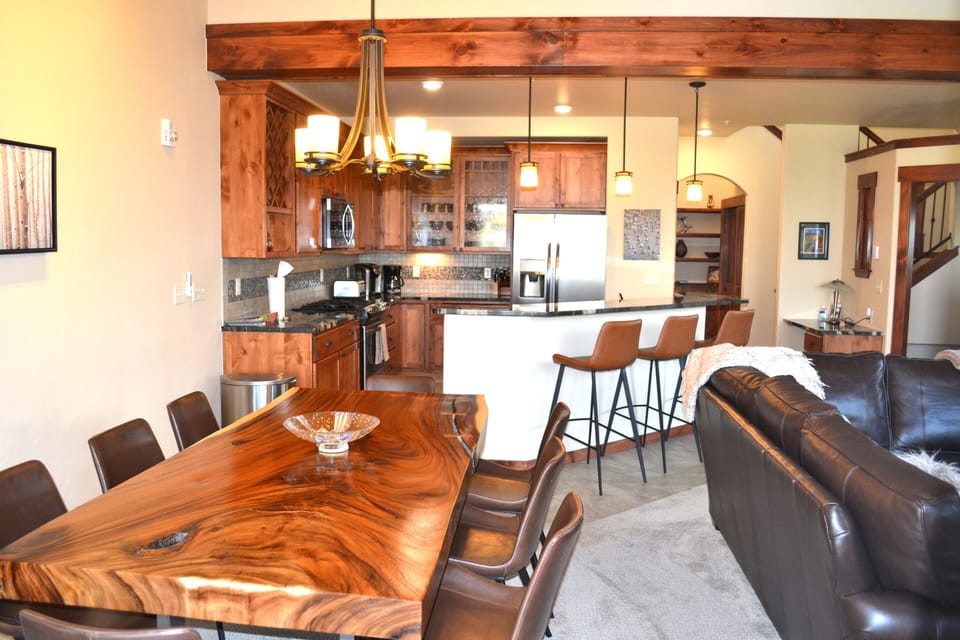 Gather around beautiful solid wood table that comfortably seats eight