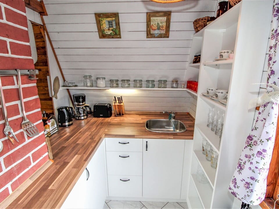 Cabinetry, Furniture, Property, Countertop, Drawer, Building, Wood, Kitchen, Interior Design, Shelf