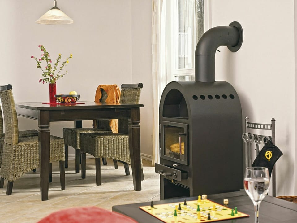 Wood-Burning Stove, Hearth, Fireplace, Stove, Room, Major Appliance, Home Appliance, Furniture, Heat, Interior Design