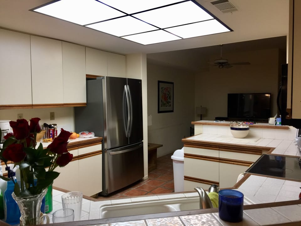 Kitchen view towards den