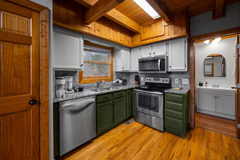 Fully Equipped Kitchen: "The kitchen amenities made cooking a breeze." - Laura