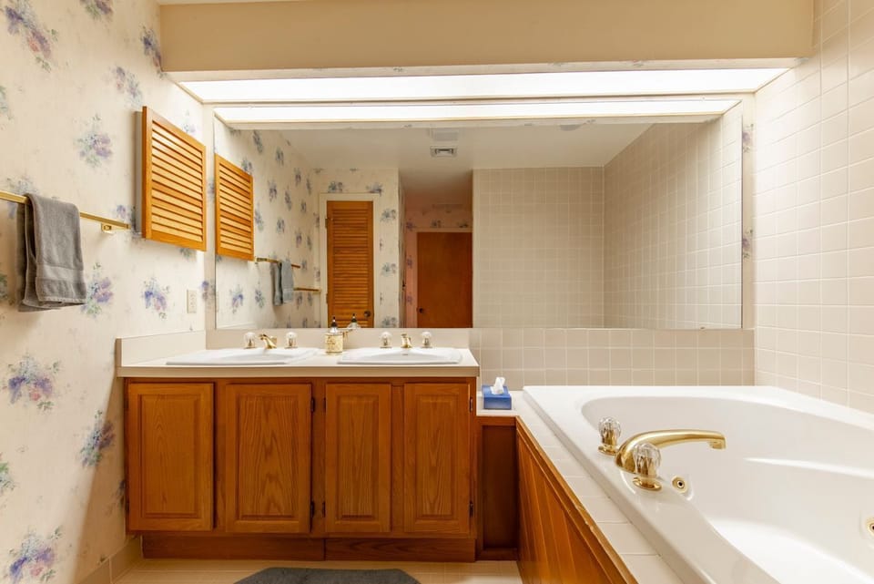 Master bathroom with double sinks and large jacuzzi tub and separate shower!