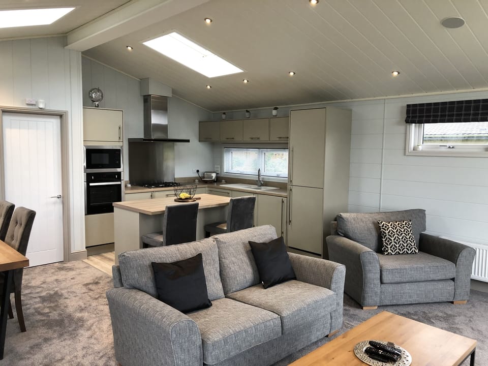 Living room with kitchen beyond