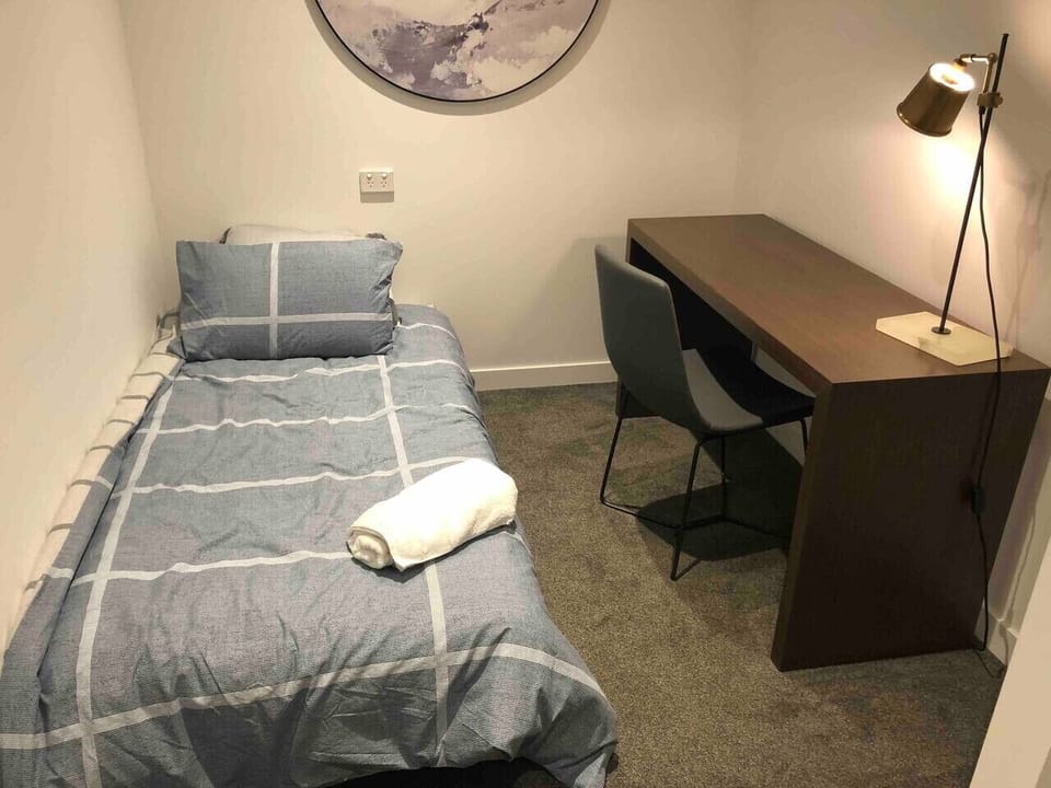 extra comfortable single bed with desk and chair,no window&door but it is seperate space