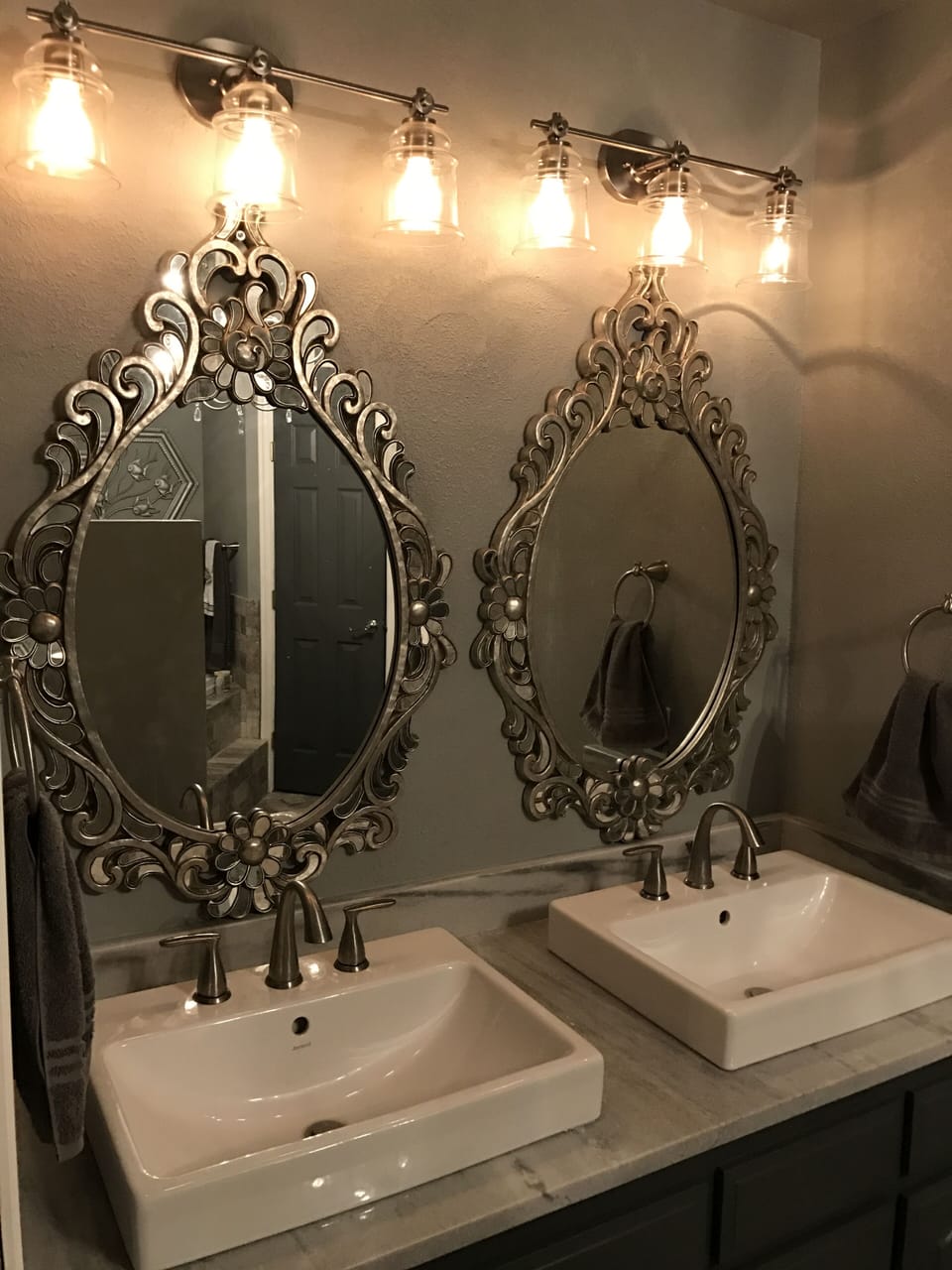 master bath with double vanity, shower and tub