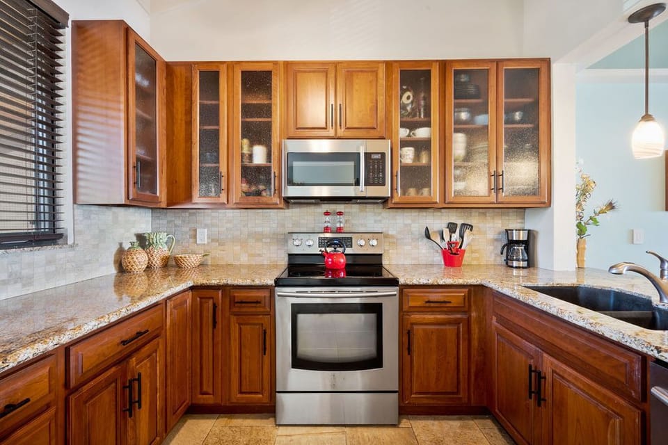 Full sized appliances and all of the small appliances needed to enjoy a quick meal or lovely homemade tropical meal.
