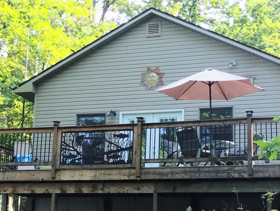 Lakeside view of Chandler's Charm huge deck.