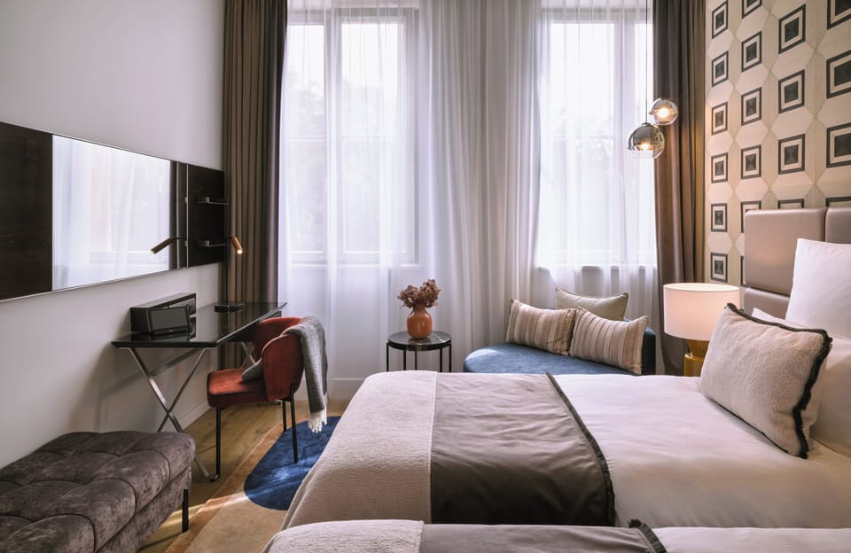 Hypo-allergenic bedding, minibar, in-room safe, desk