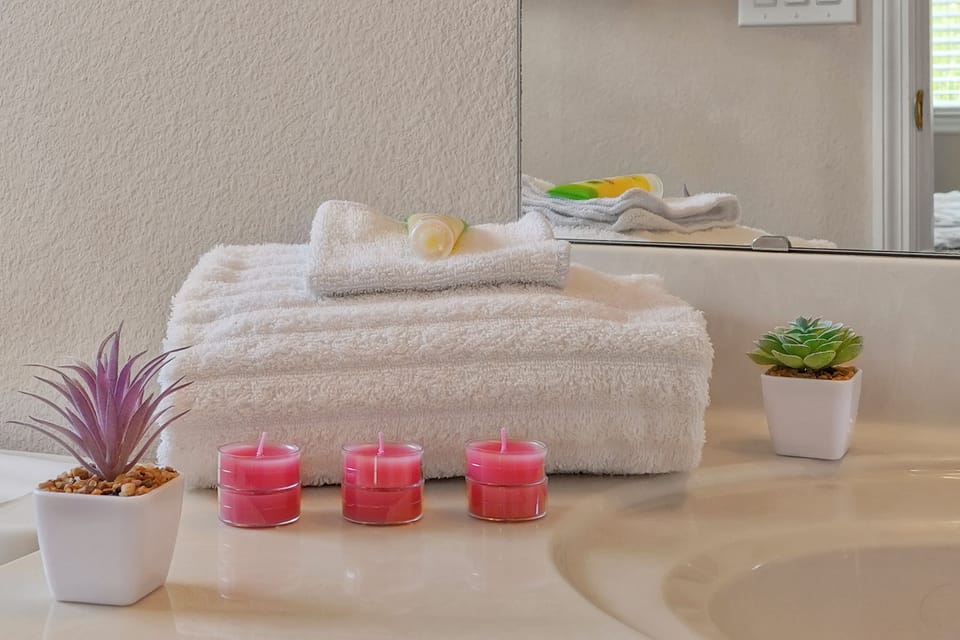 Freshly laundered, crisp white linens await you in every bedroom