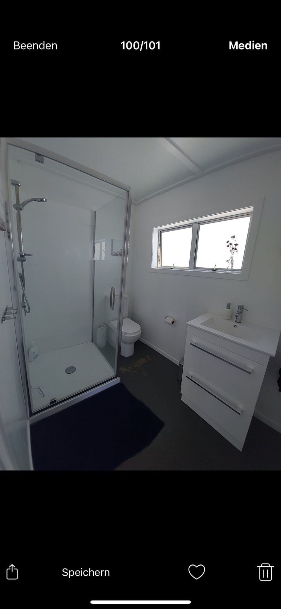 Bathroom with shower and toilet.