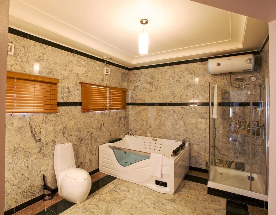 Shower, free toiletries, slippers, towels