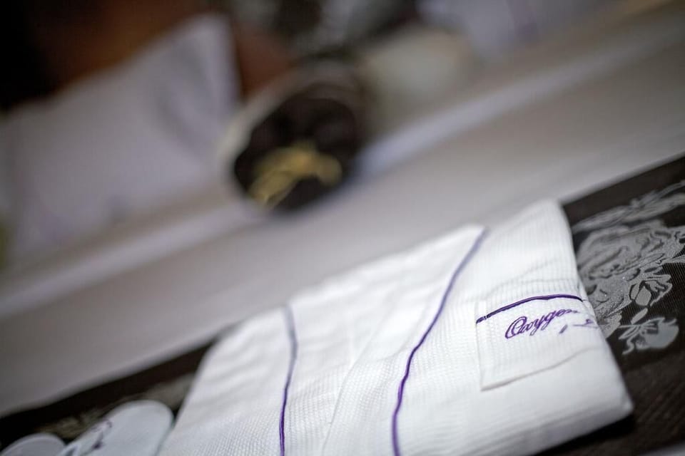 Executive Room | Bathroom amenities | Shower, free toiletries, slippers, towels